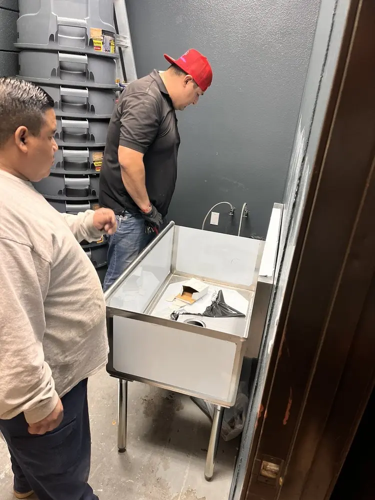 Commercial plumbing and sink installation in West End